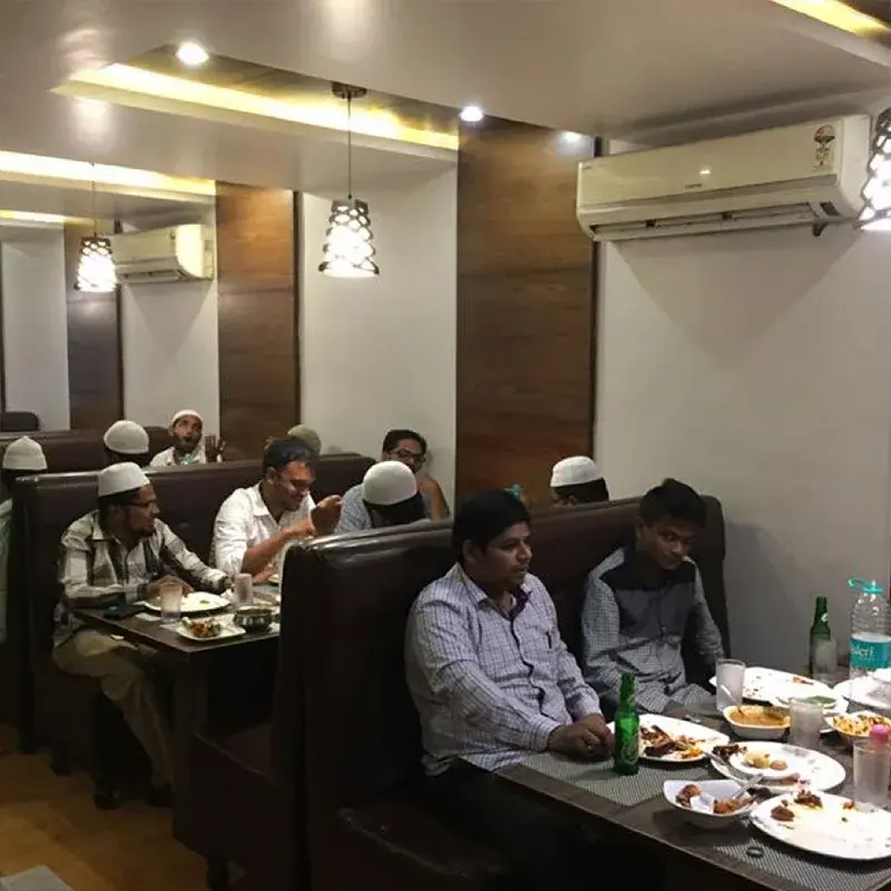 Family dining at AHMEDIA Hotel — Bus Stand, Vaniyambadi